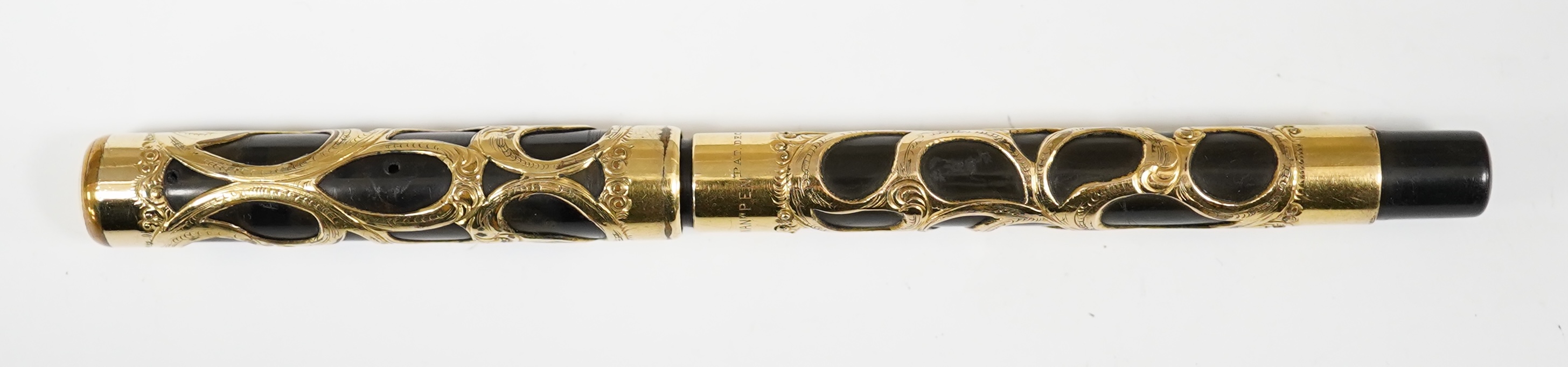 A Swan gold filled filigree Eyedropper, with an over and under feed